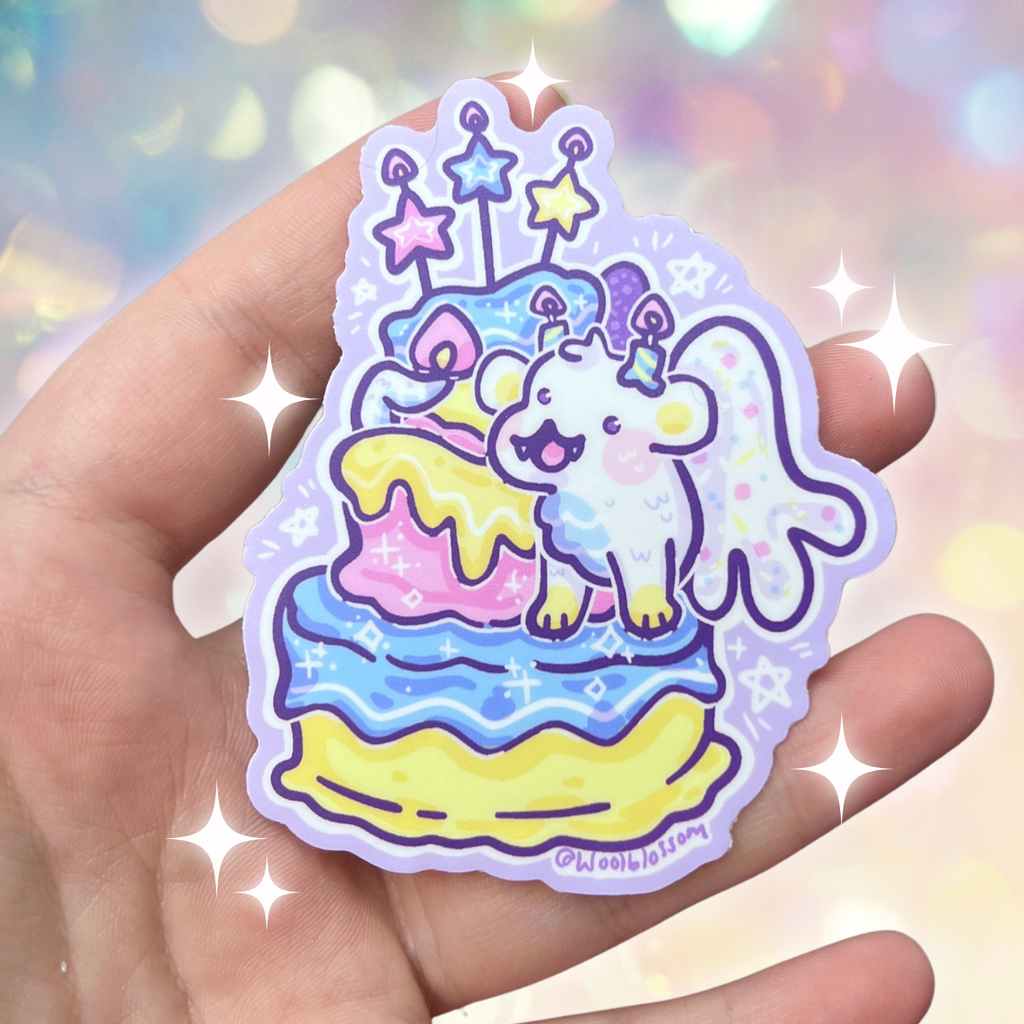 A sticker of a three tier birthday cake with a white dragon happily wrapped around it