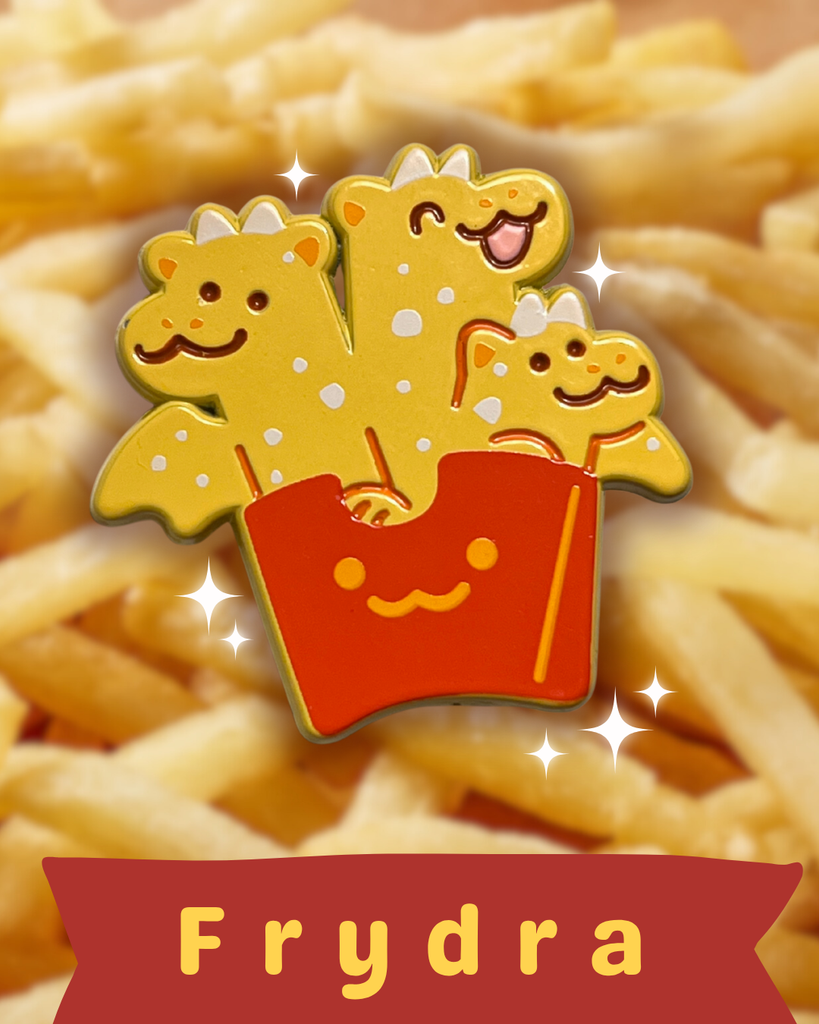 Pin with cartoon fry dragons in a box on a background of fries, featuring the brand 'Frydra'.