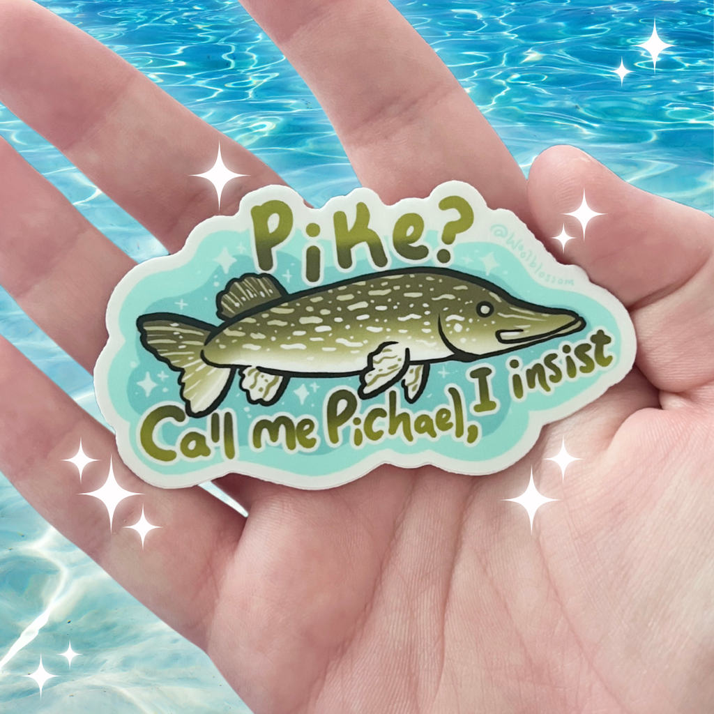 Sticker with a pike illustration and text saying "pike? call me pichael, i insist" held in a hand against a water background