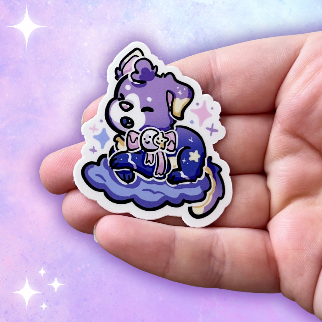 A sticker of a puppy with a purple gradient skin, moon/star bow, and is on a purple cloud.