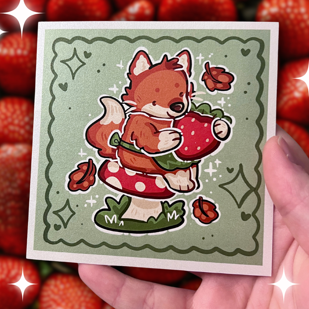 A print of a red fox with a little green apron sitting on a red mushroom, holding a strawberry with autumn leaves falling