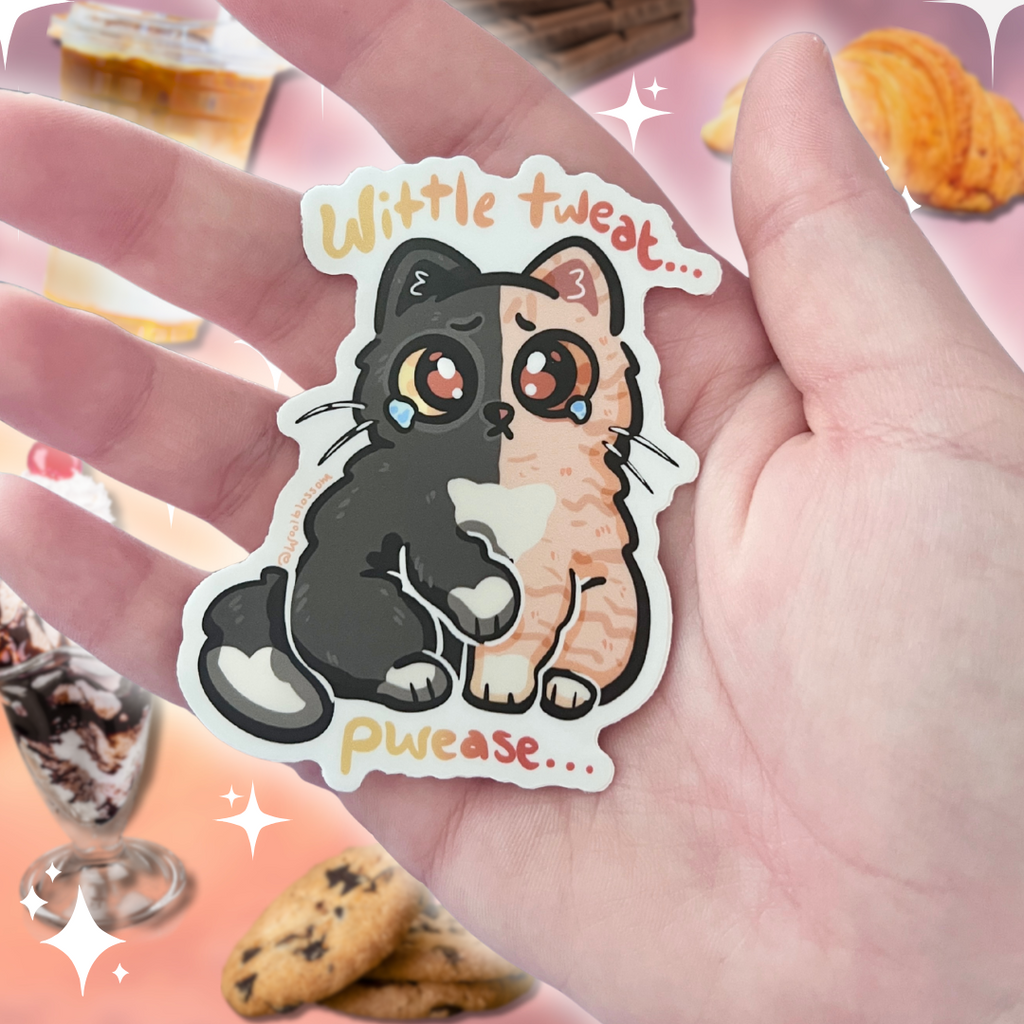 Hand holding a sticker of a cartoon cat with text 'Little tweet... please...' against a blurred background with food items.