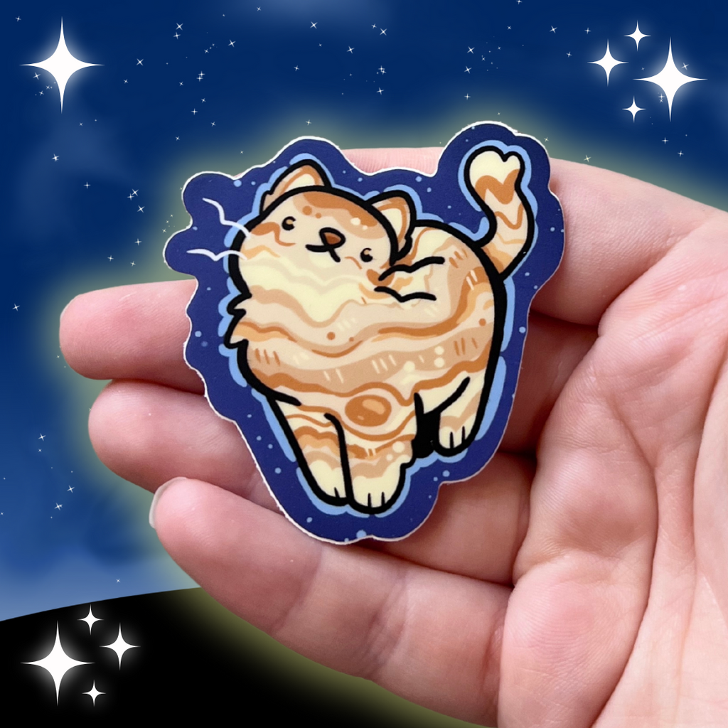 a sticker of an orange cat with markings like jupiter's