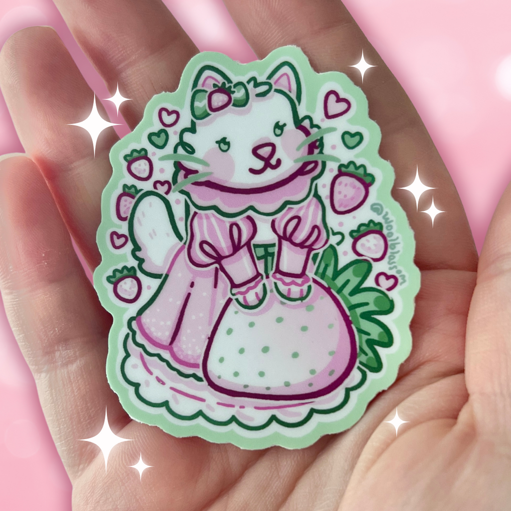 A sticker of a white cat in a victorian dress with a big pine berry