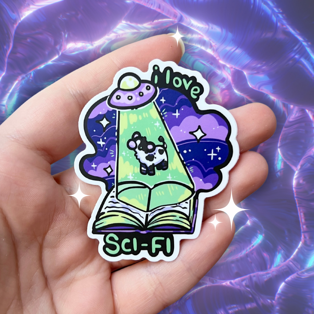 A book genre inspired sticker that says "I love sci-fi" and features a cow being abducted by a UFO