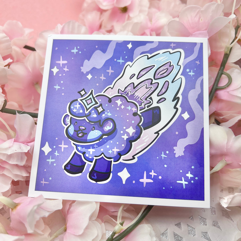 a print of a dark purple/blue sheep made to seem like a shooting star, with glittery details and trail behind them