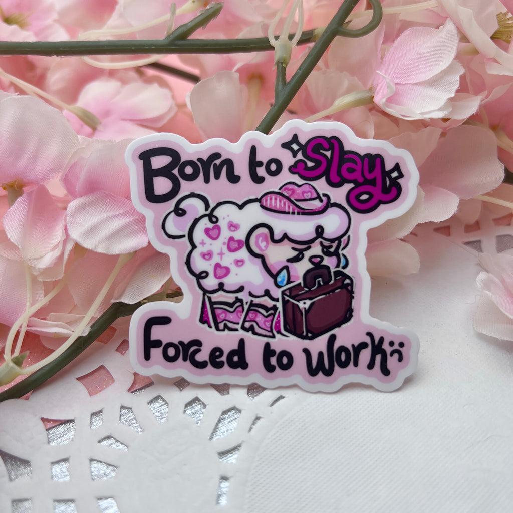 A sticker of sprout the sheep dressed in pink glitter cowgirl hat and boots, sadly holding a suitcase in their mouth. Text says "born to slay, forced to work"