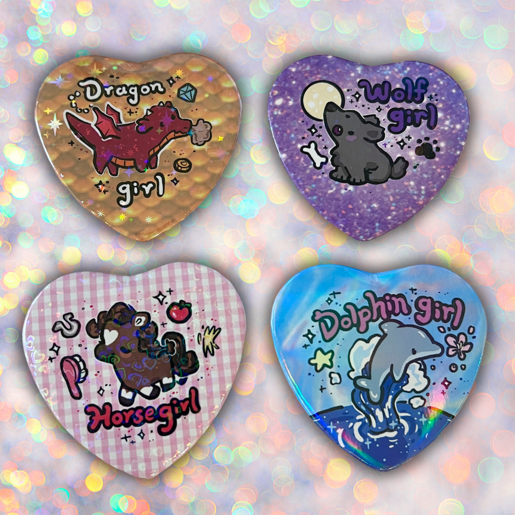 4 heart buttons with a different animal/phrase: dragon girl, wolf girl, horse girl, and dolphin girl