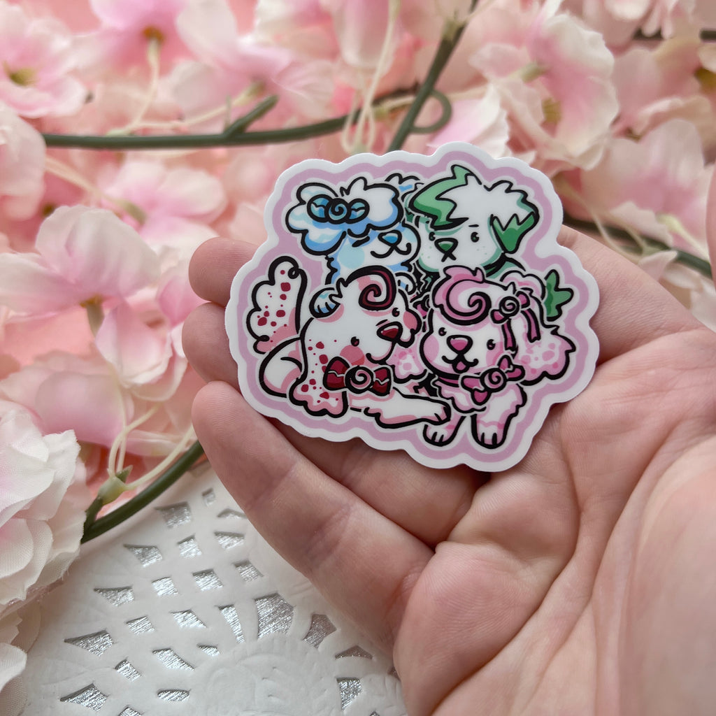 A sticker of 4 peppermint themed puppies