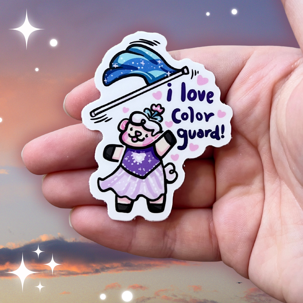 a sticker of sprout the sheep in a purple dress tossing a blue flag mid-air with the text "I love color guard"