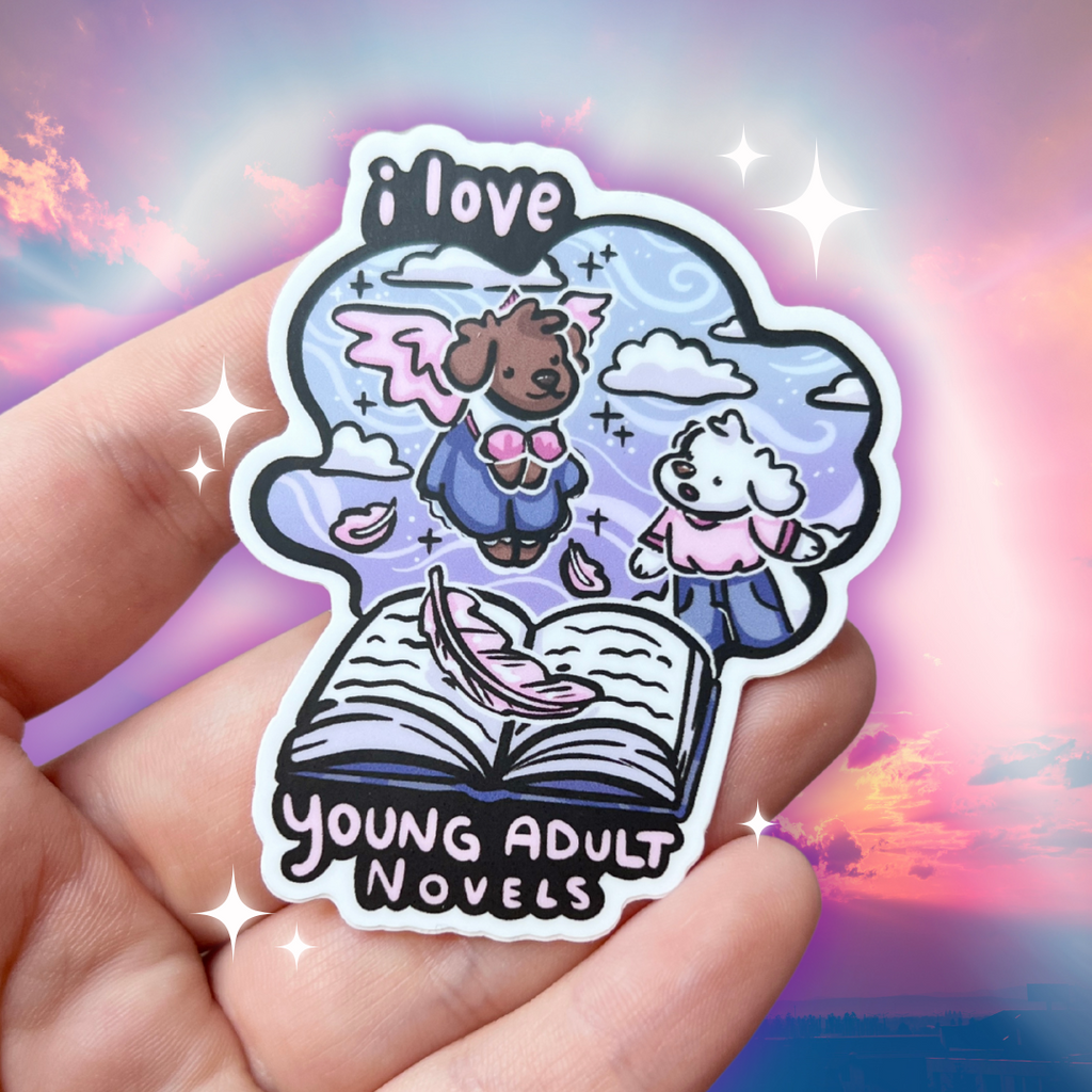 A book genre inspired sticker that says "I love YA novels" and features an angel puppy