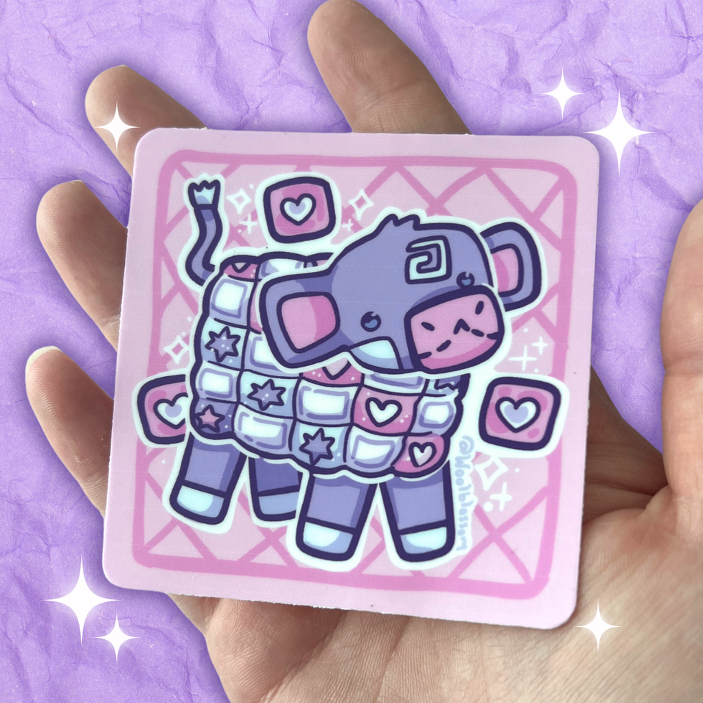 A sticker of a cow that is made out of quilt squares