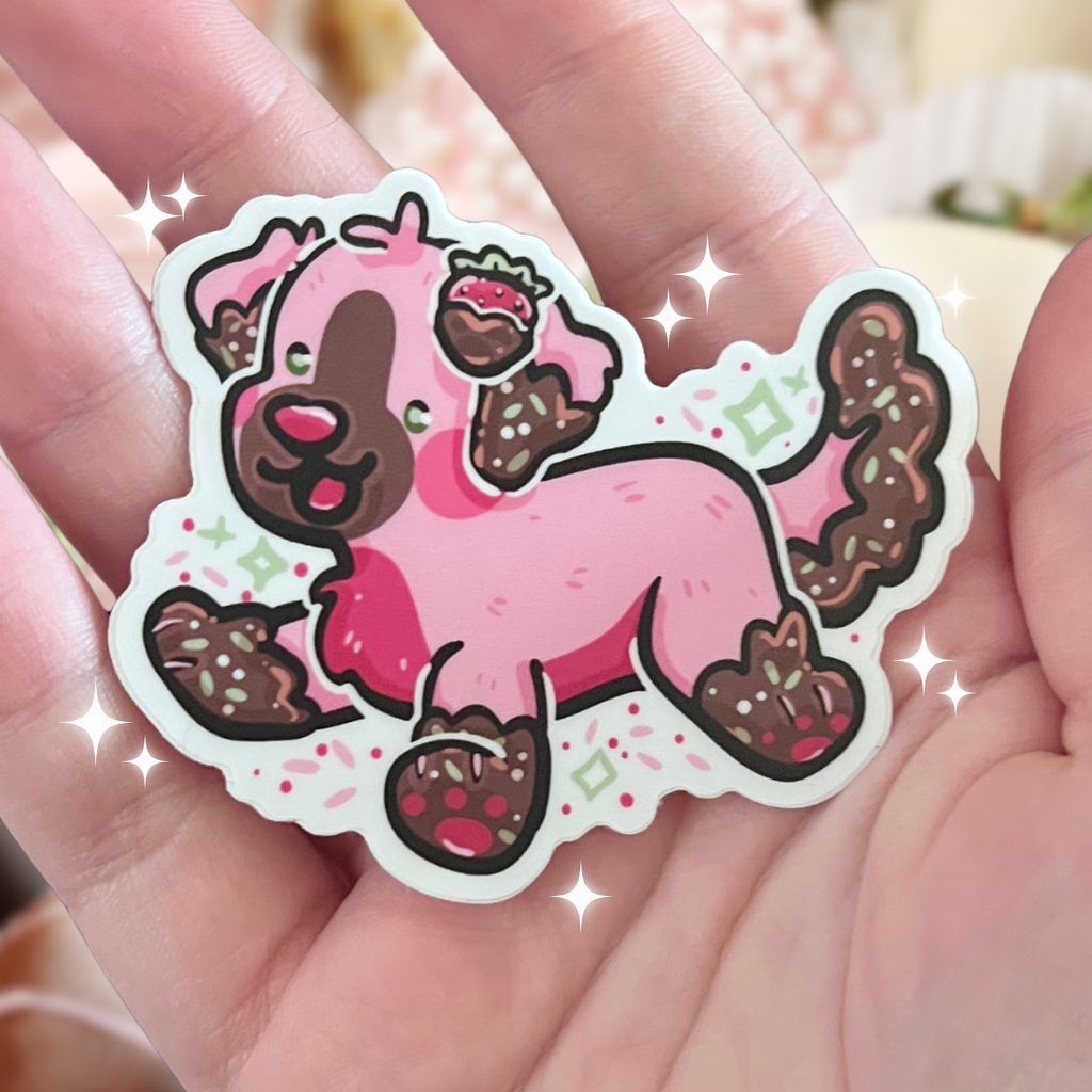 Photo of a pink puppy with chocolate covered sprinkle details