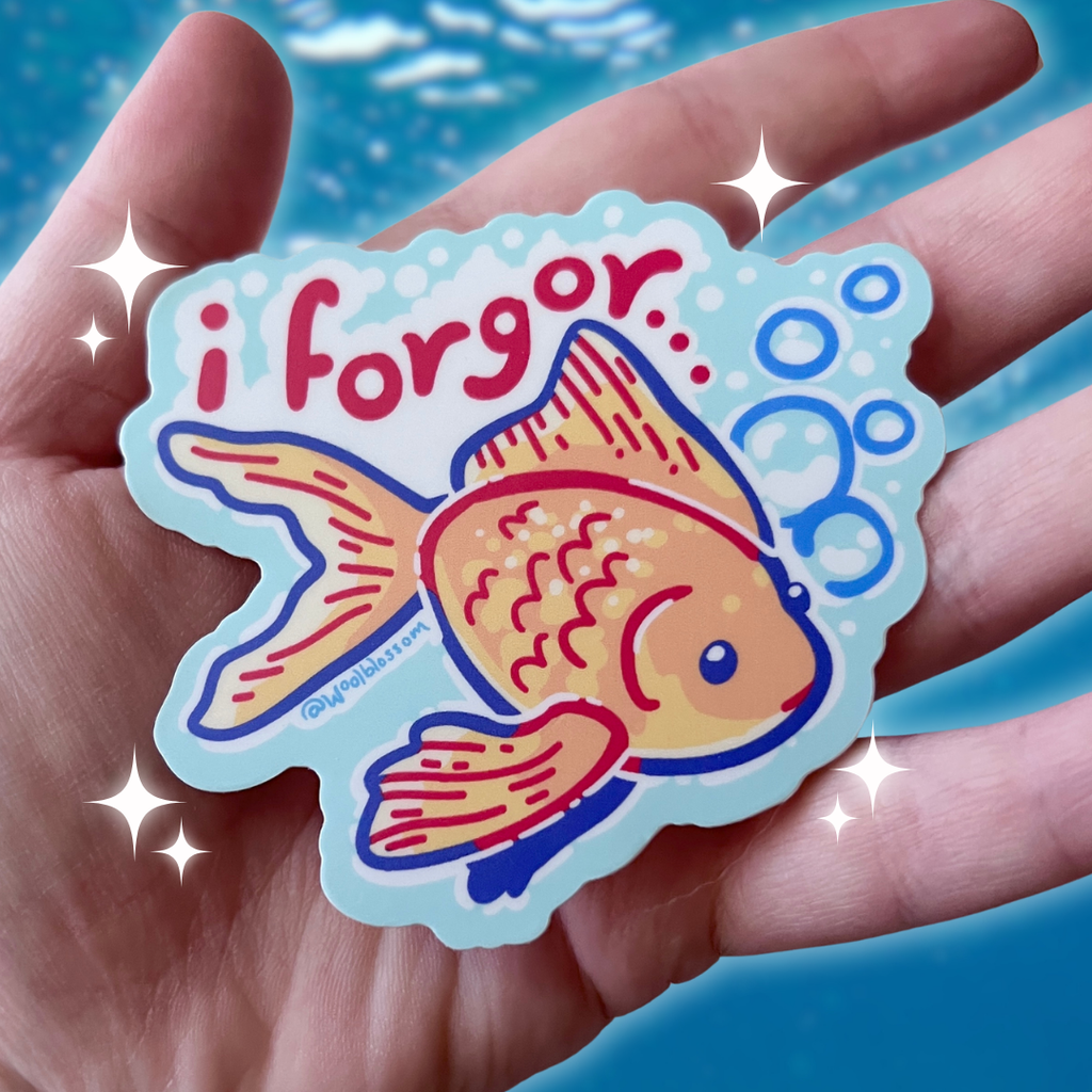 A sticker of a gold fish with text that says "i forgor"