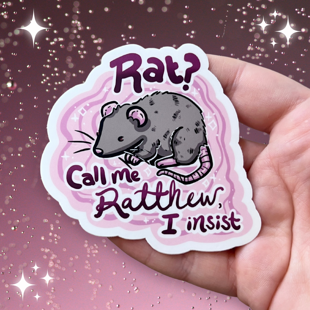 a sticker of a grey rat on a pink solid background with the text "Rat? Call Me Ratthew, I Insist"