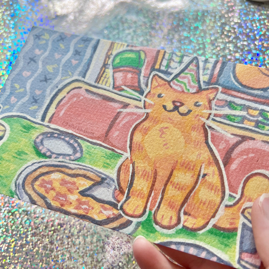 a print of a cat with a party hat on glitter paper