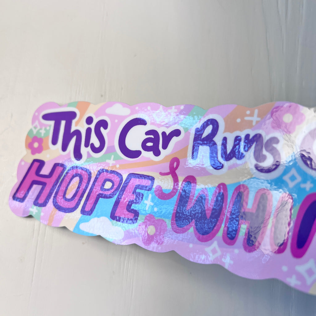  a colorful bumper sticker with text 'This Car Runs On HOPE & WHIMSY'