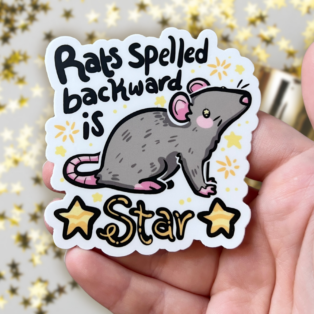 sticker of a gray rat with the text "rats spelled backward is star" and gold star accents