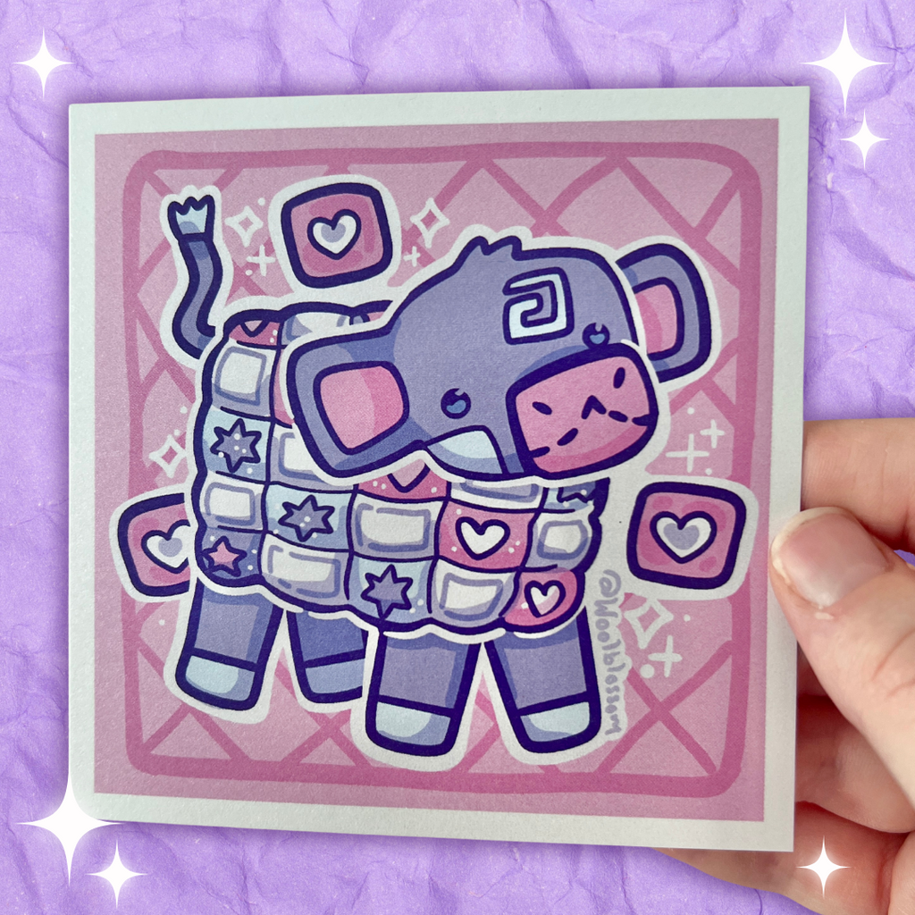 A print of a cow that is made out of quilt squares