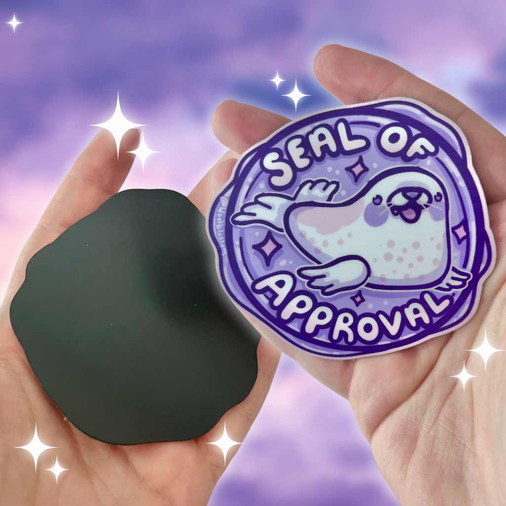 A magnet of a wax seal with an animal seal on it and text that says "seal of approval"
