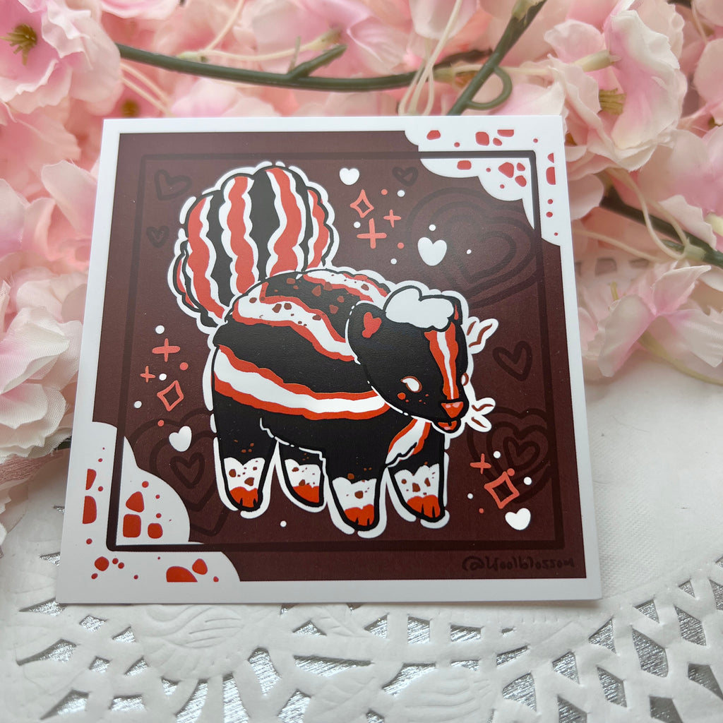 A print of a mostly normal skunk with red accents and chocolate spots, in front of a chocolate background