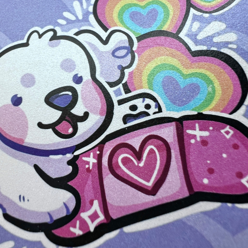 A print of a white puppy happily holding a pink bandage with rainbow hearts popping up