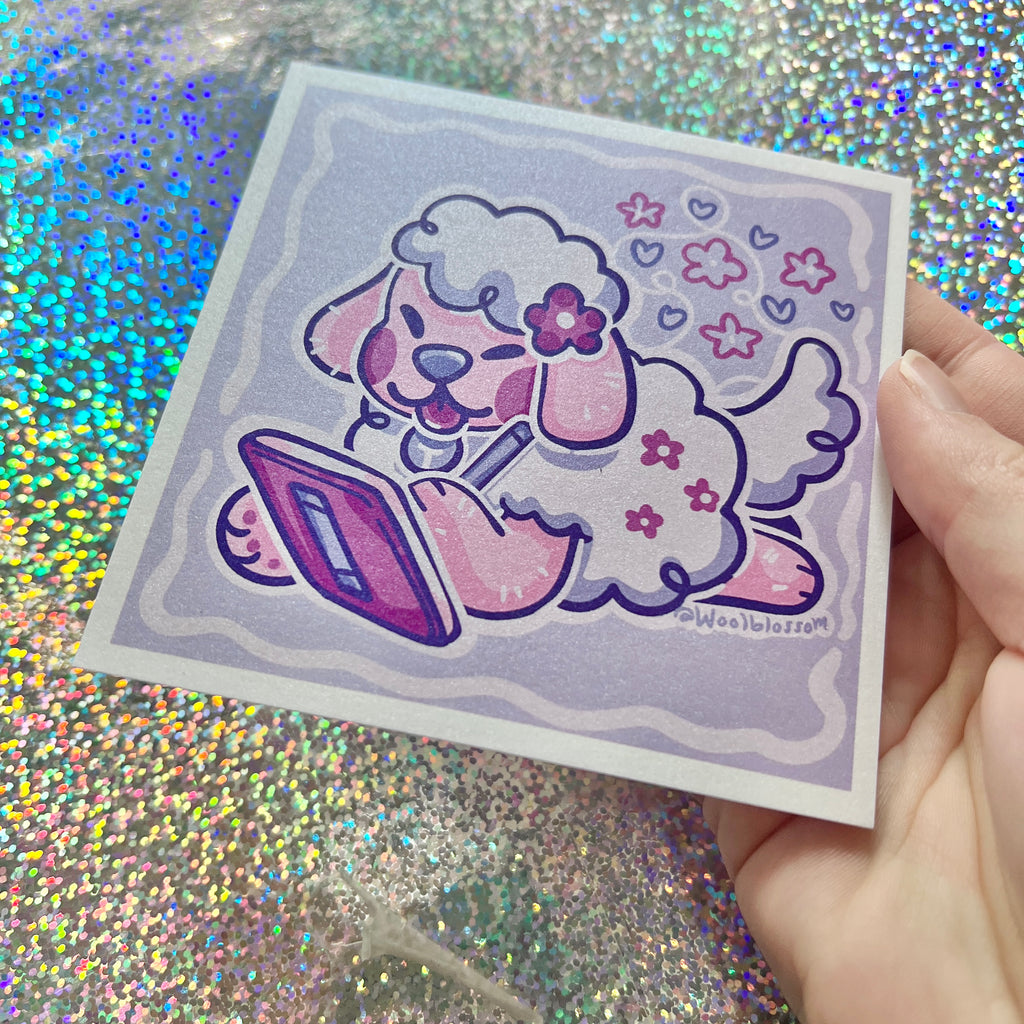 print of a sheep dog drawing on a digital tablet on a glittery background