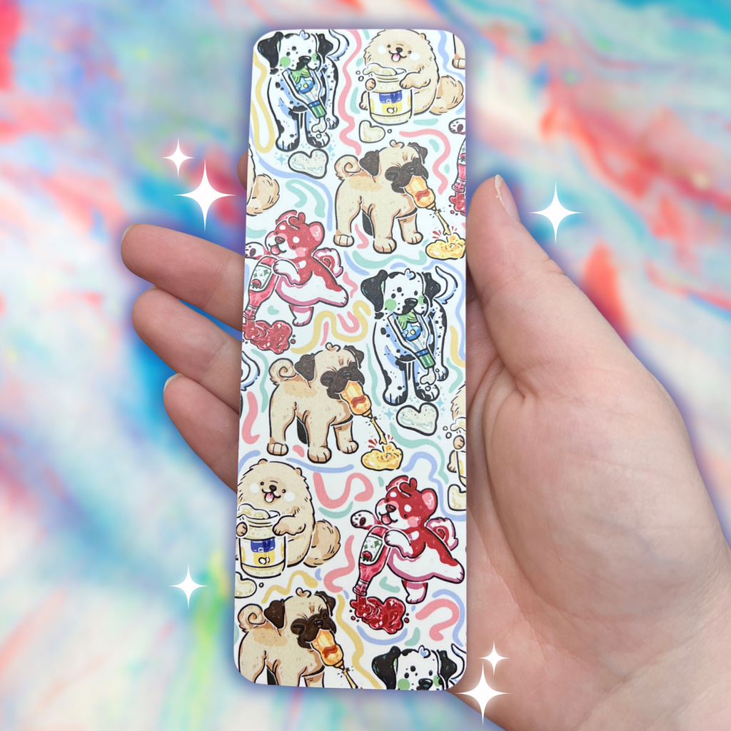 A bookmark featuring a pattern of condiment themed puppies