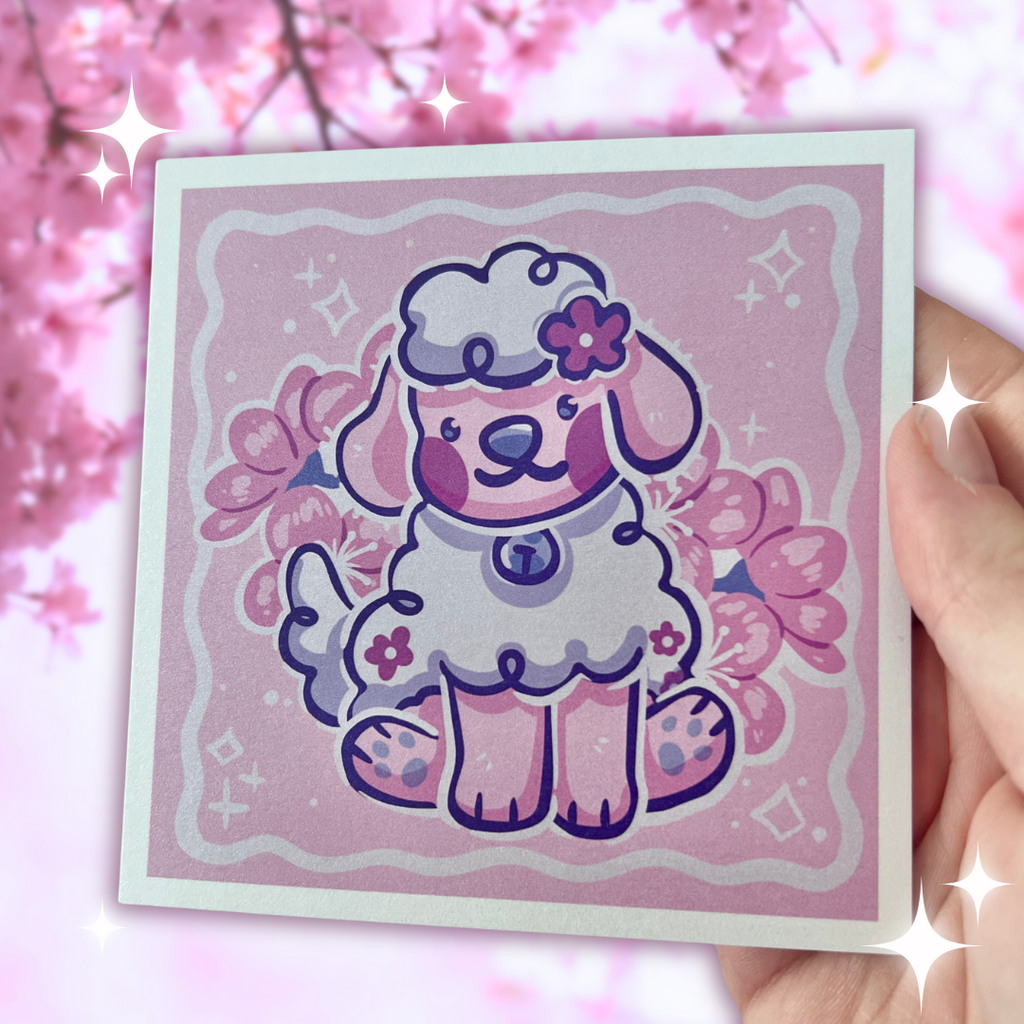 a print of cherry blossom the dog sitting with cherry blossoms behind her