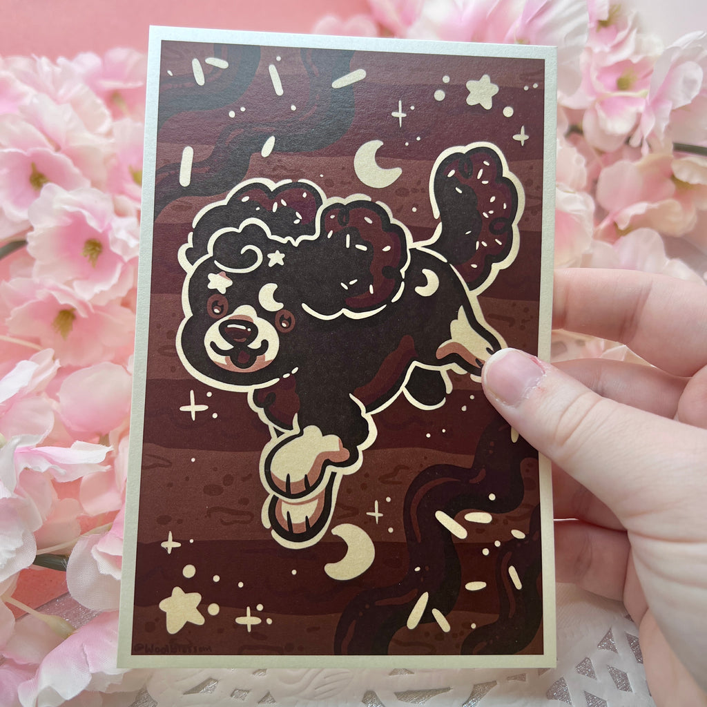 A print of a midnight chocolate cake based puppy, dark brown with cream accents like stars and moons, jumping in front of a pattern that resembles alternating frosting and cake