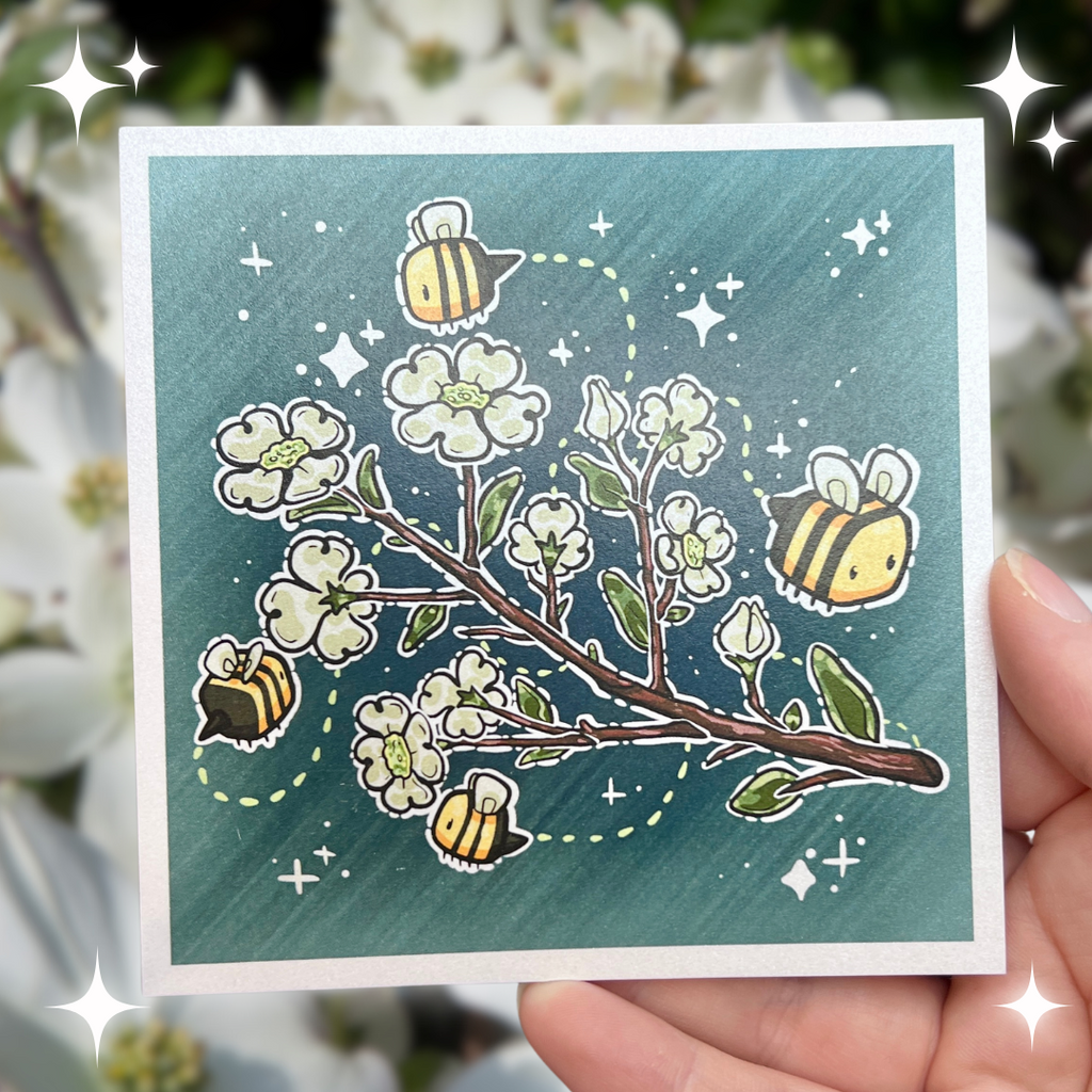 A print of a branch of dogwood flowers with 3 bees flying around