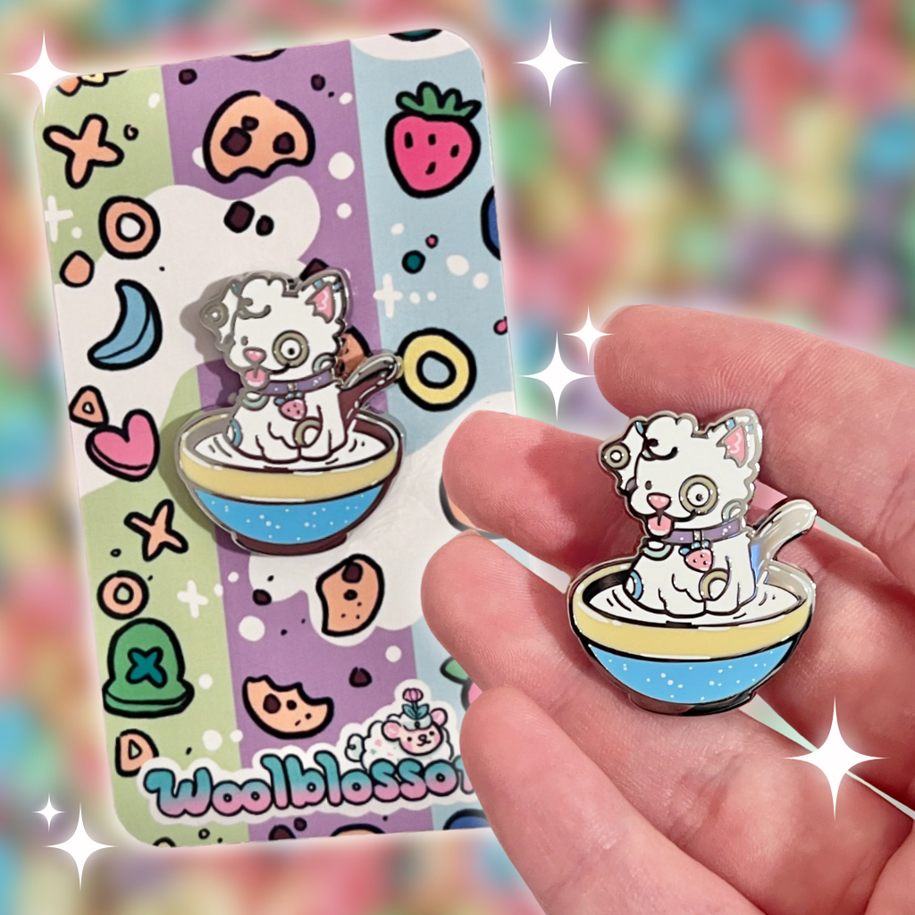 An enamel pin of a fruity cereal themed puppy sitting in a bowl of milk