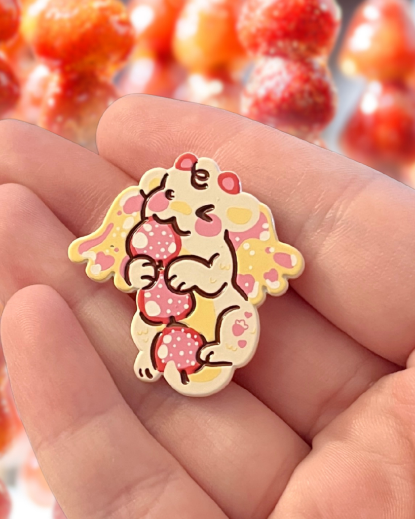 tanghulu dragon pin held in a hand