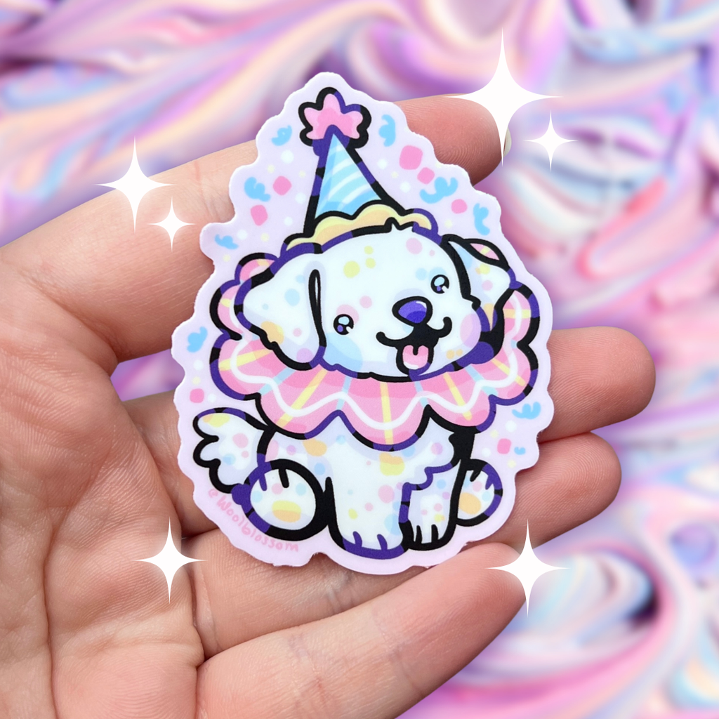 A sticker of a puppy in a little clown outfit