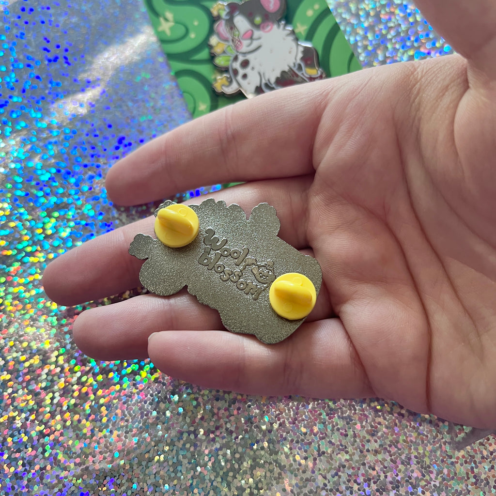 Same pin showing the back stamp