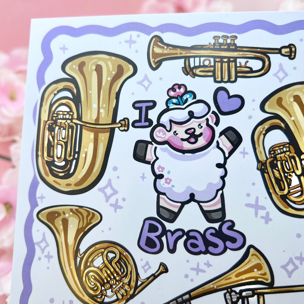 a print of a sheep with the text "I heart brass" and five instruments floating around them (tuba, trumpet, euphonium, trombone, and french horn)