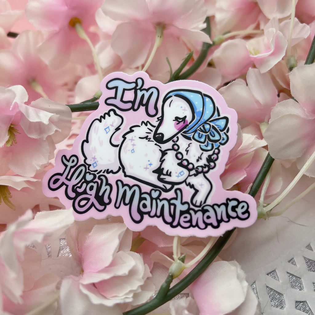 sticker of a white borzoi dog in a scarf headwrap and pearls with the text "I'm high maintenance"