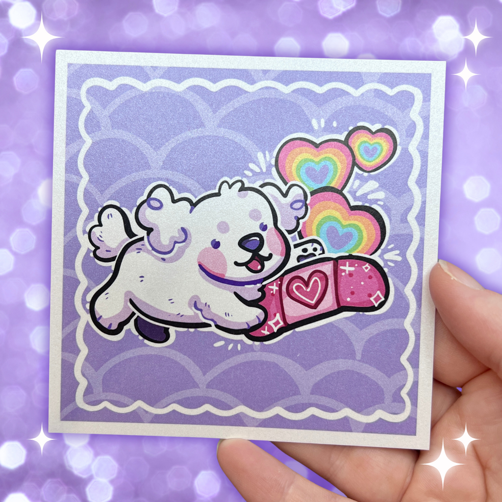 A print of a white puppy happily holding a pink bandage with rainbow hearts popping up