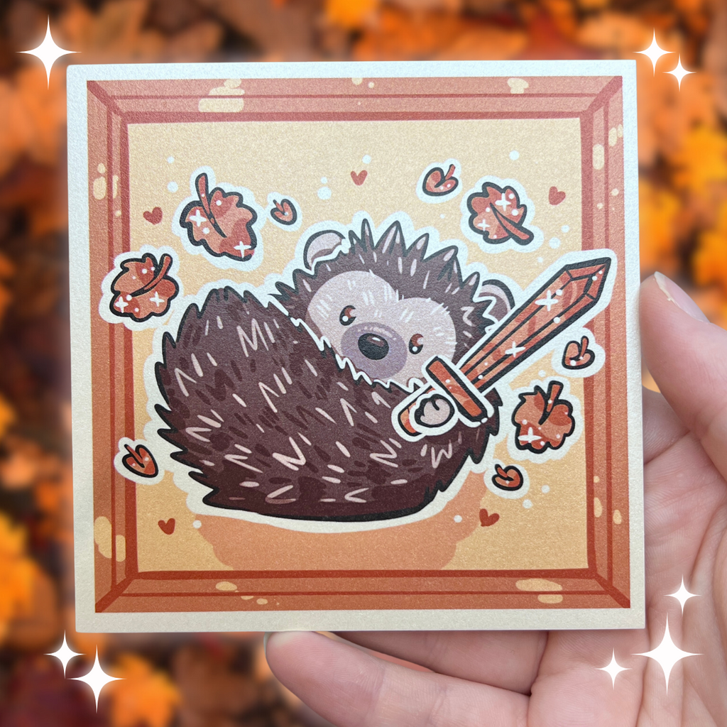 A print of a hedgedhog holding a sword with orange leaves falling around him