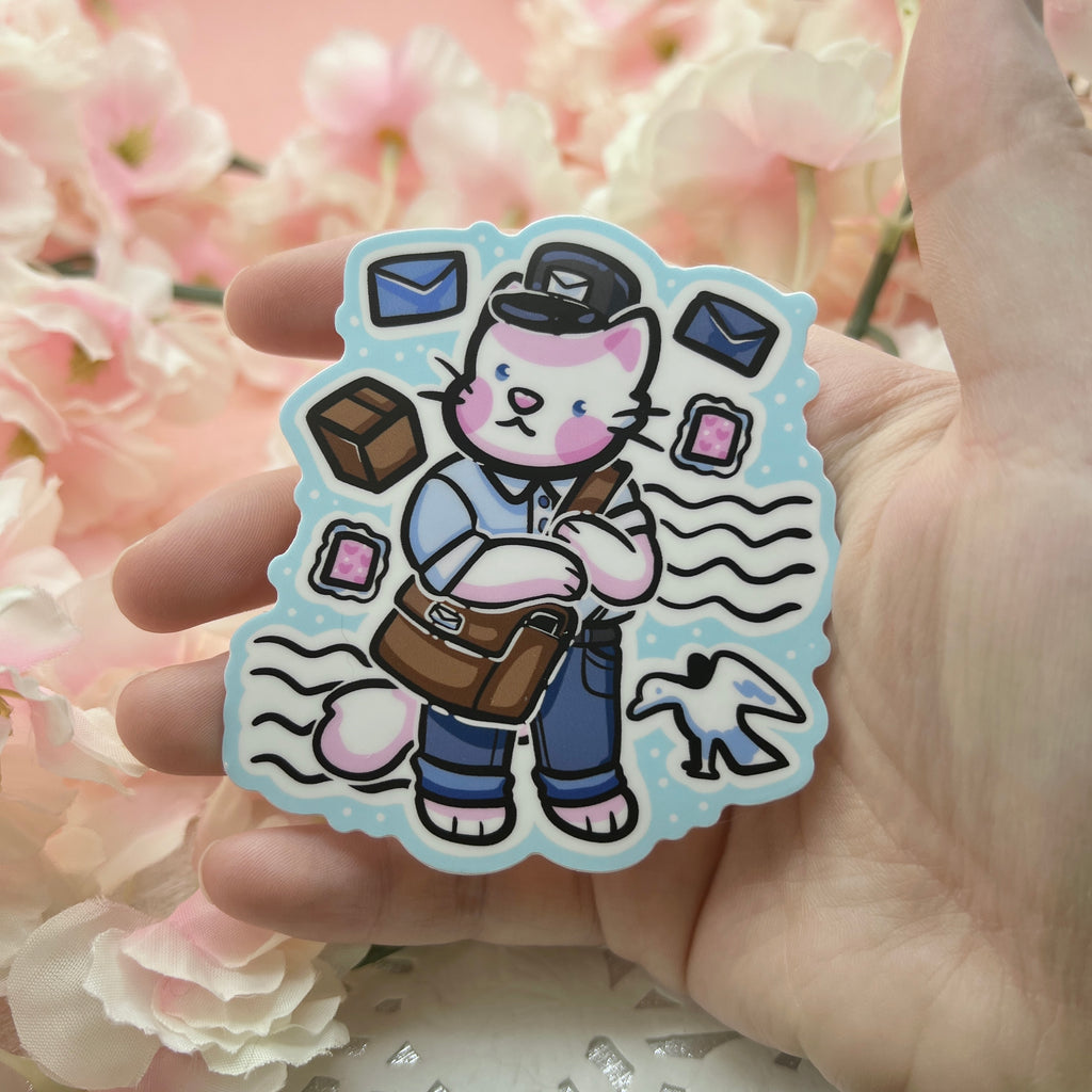 A sticker of a cat in a mail uniform and bag with stamps and boxes around them