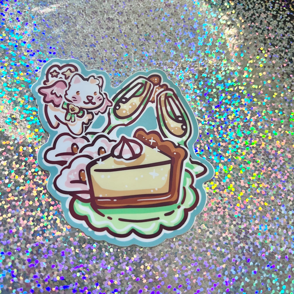 Sticker of a white angel cat flying around a celebration meal on a glittery background
