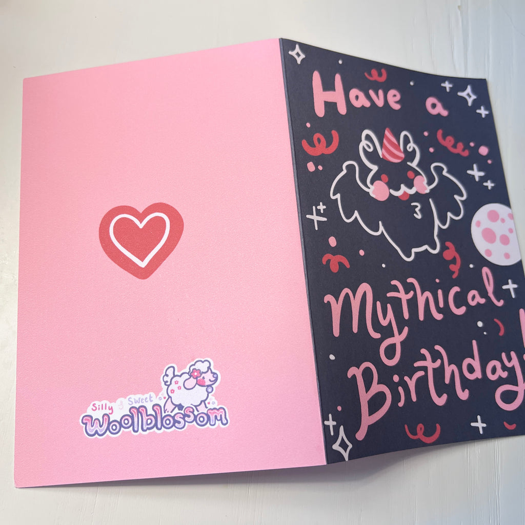 Pink and black birthday card with cartoon mothman and text on a white background