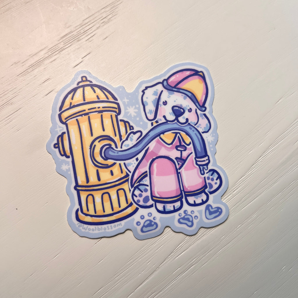 Sticker of a cartoon dog with a hose and fire hydrant on a light wooden surface