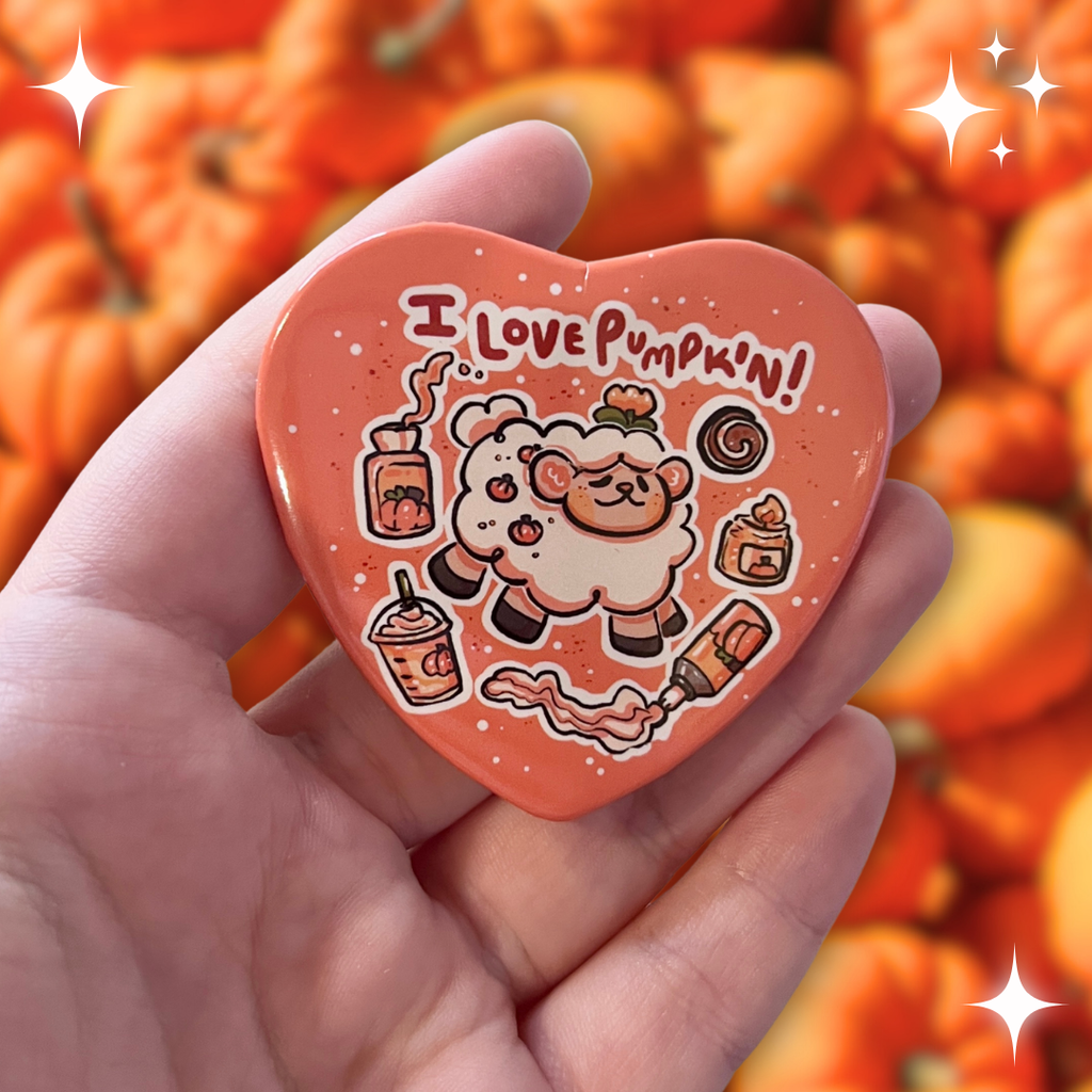 A button of a sheep with text that says "i love pumpkin!" and floating pumpkin themed items (candle, cofffee, etc.) all in a heart