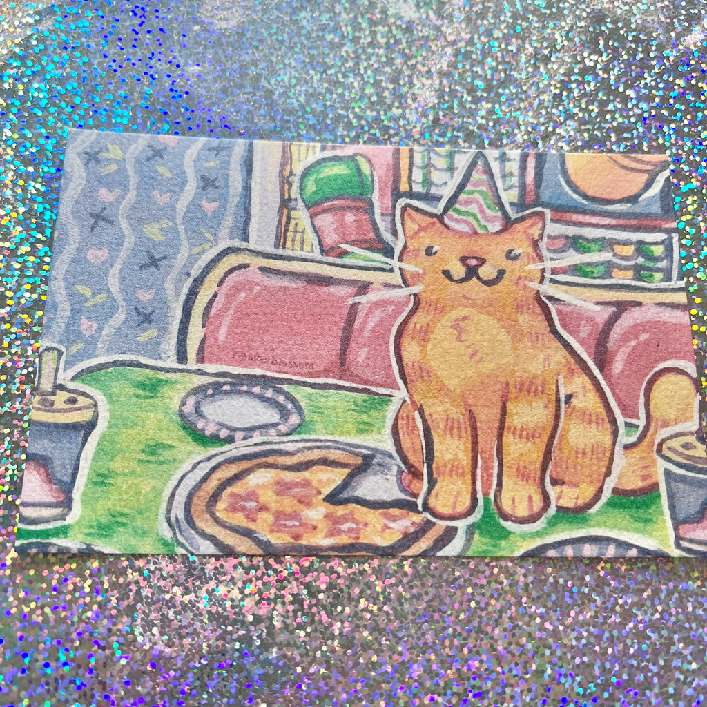 a print of a cat with a party hat on glitter paper