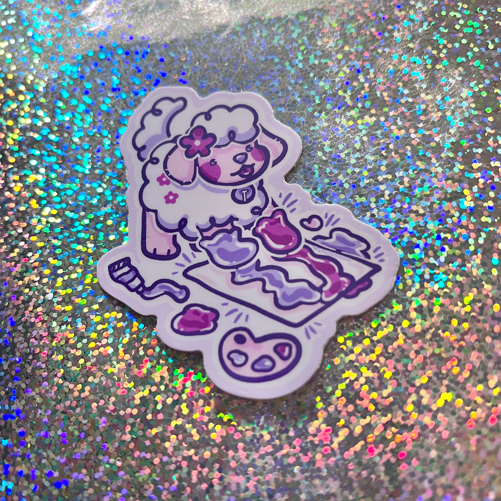 Sticker of a cartoon puppy paw painting on a glittery background