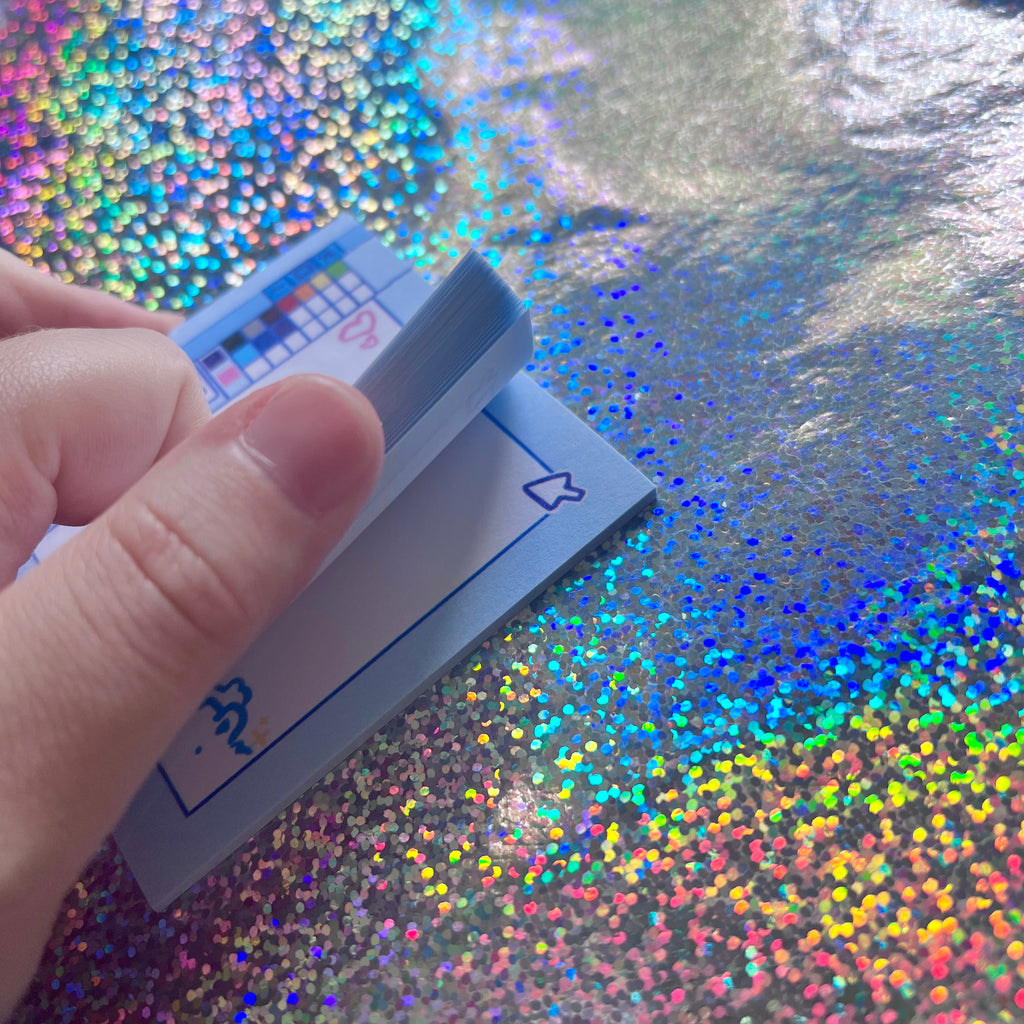 sticky notes that mimic old digital paint programs held by hand