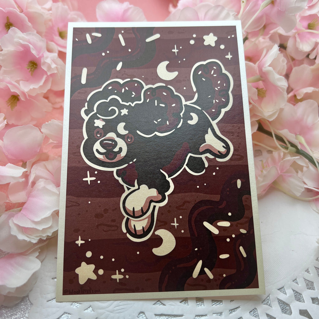 A print of a midnight chocolate cake based puppy, dark brown with cream accents like stars and moons, jumping in front of a pattern that resembles alternating frosting and cake