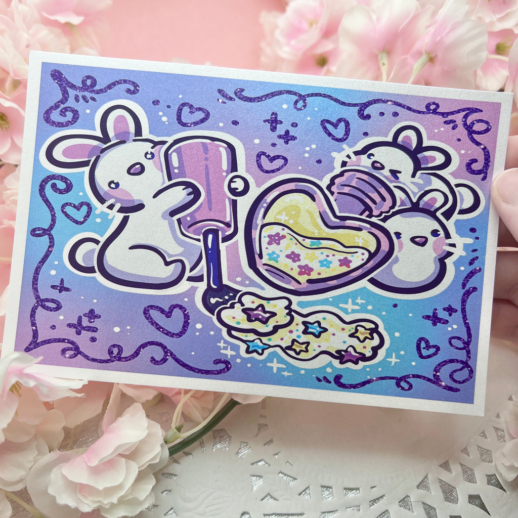 A print of three bunnies playing with glitter nail polish