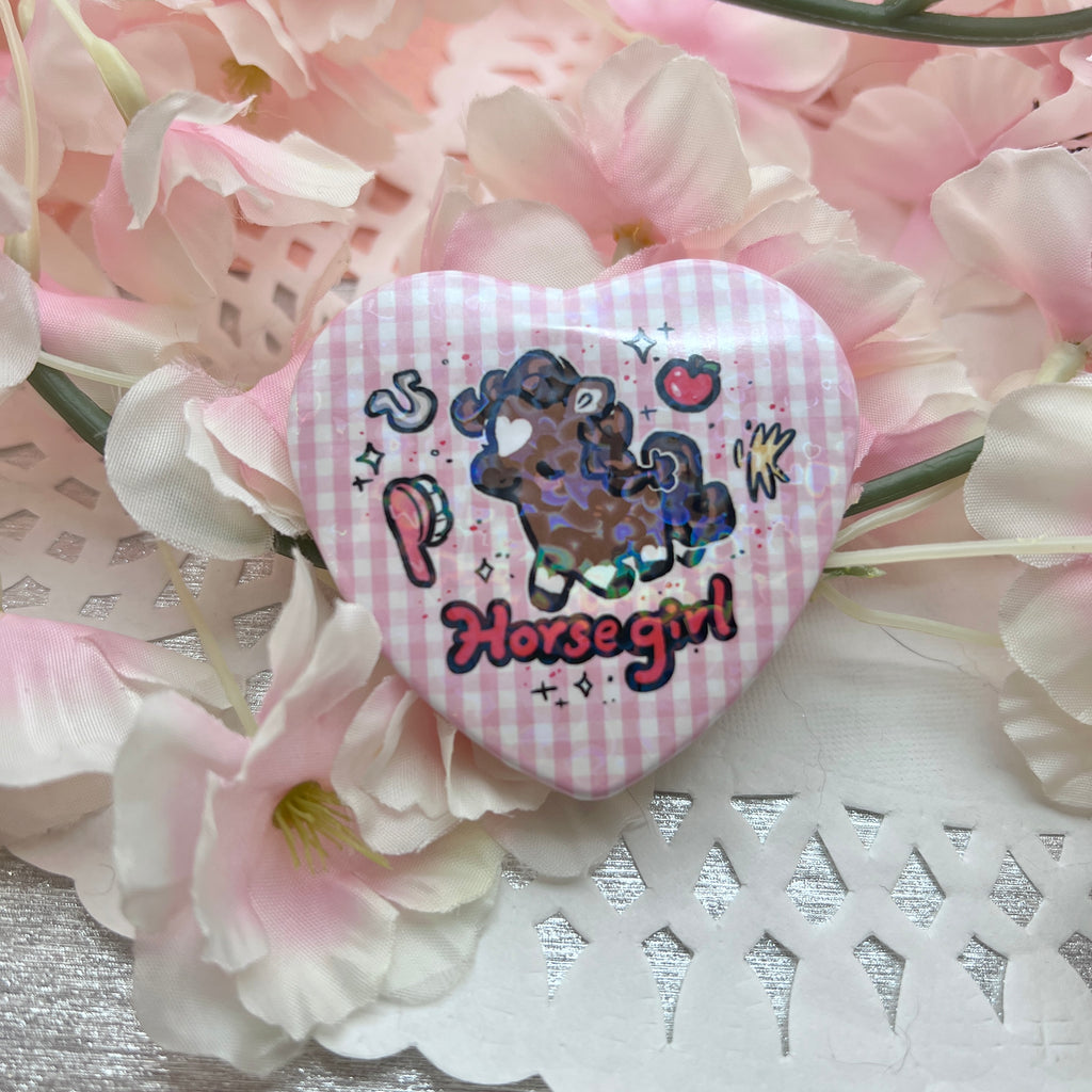 a heart button that says horse girl with pink plaid and a brown horse surrounded with horse items like apple and a brush